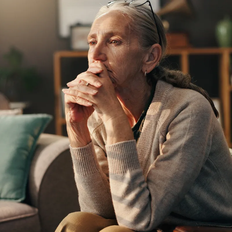 addiction in older adults. Woman looking worried.