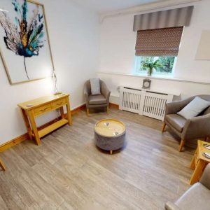 drug and alcohol rehab consultation room with chairs and table