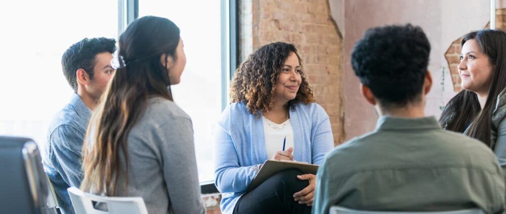 Therapy session in a drug and alcohol rehab Ealing