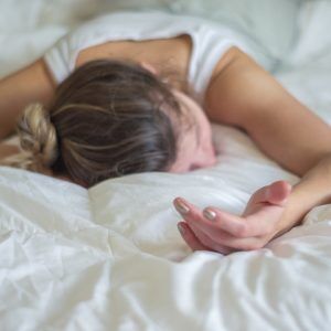 Woman fainted in bed.